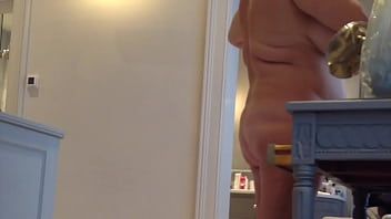 Play Unaware milf with big tits caught naked in dressing room